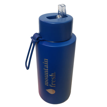 Frank Green 1L reusable green water bottle with secure lid, ideal for hydration on the go.