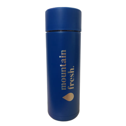 Frank Green 595ml Mountain Fresh reusable bottle with branding and modern design on white background.