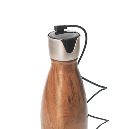 Rechargeable UV-LED drink bottle, modern design in white and silver, showing portable and hygienic use.